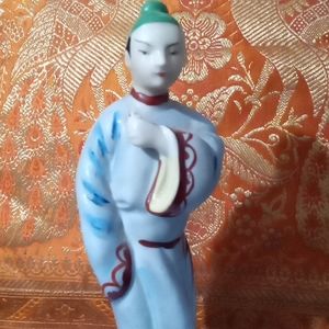 "Occupied Japan " porcelain  fine  ceramic figurine of a Japanese lord.